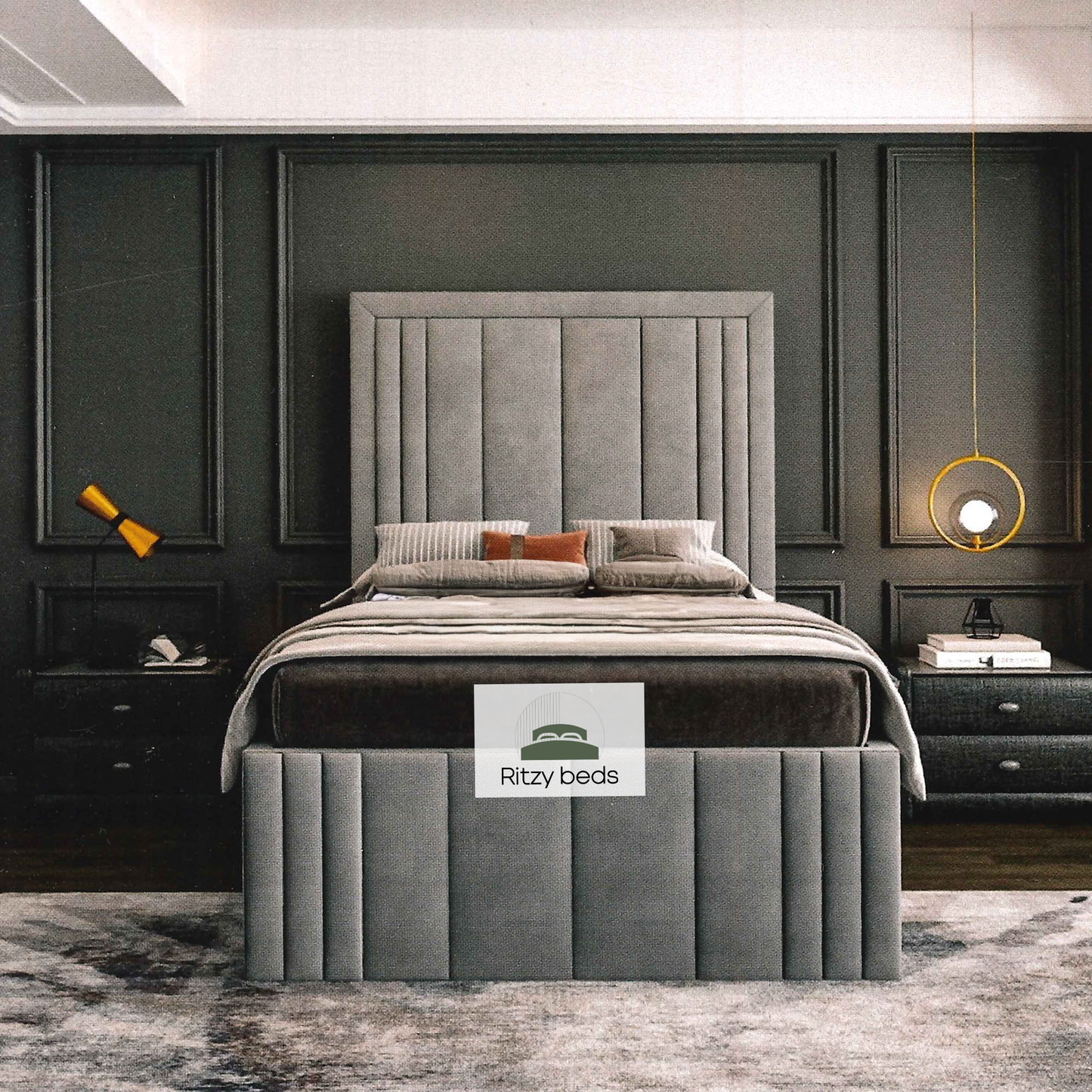 Gray upholstered british bespoke bed with tufted design in a modern bedroom setting, featuring the 'Ritzy Beds' brand.