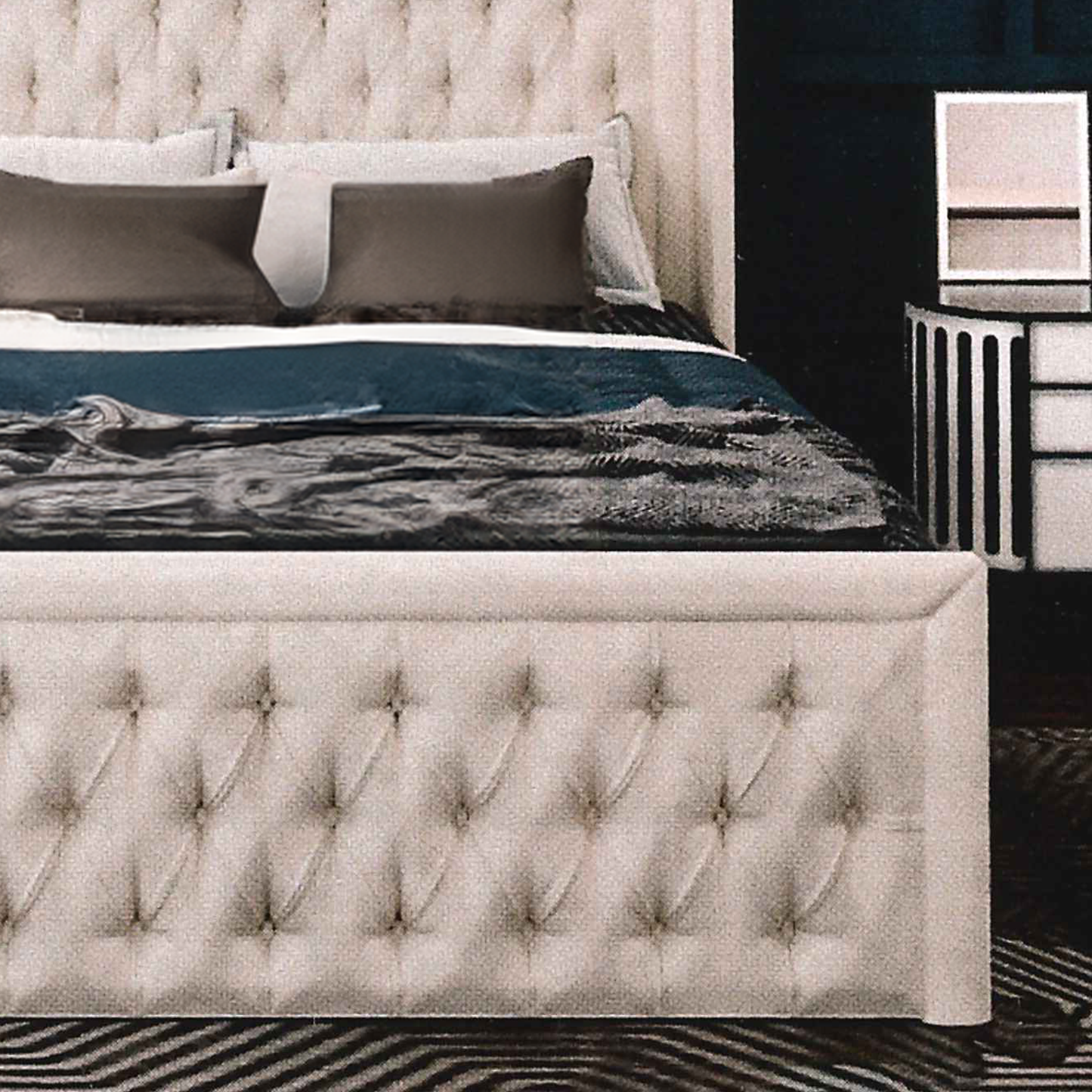 Luxury bedroom with tufted footboard, headboard and decorative bedding