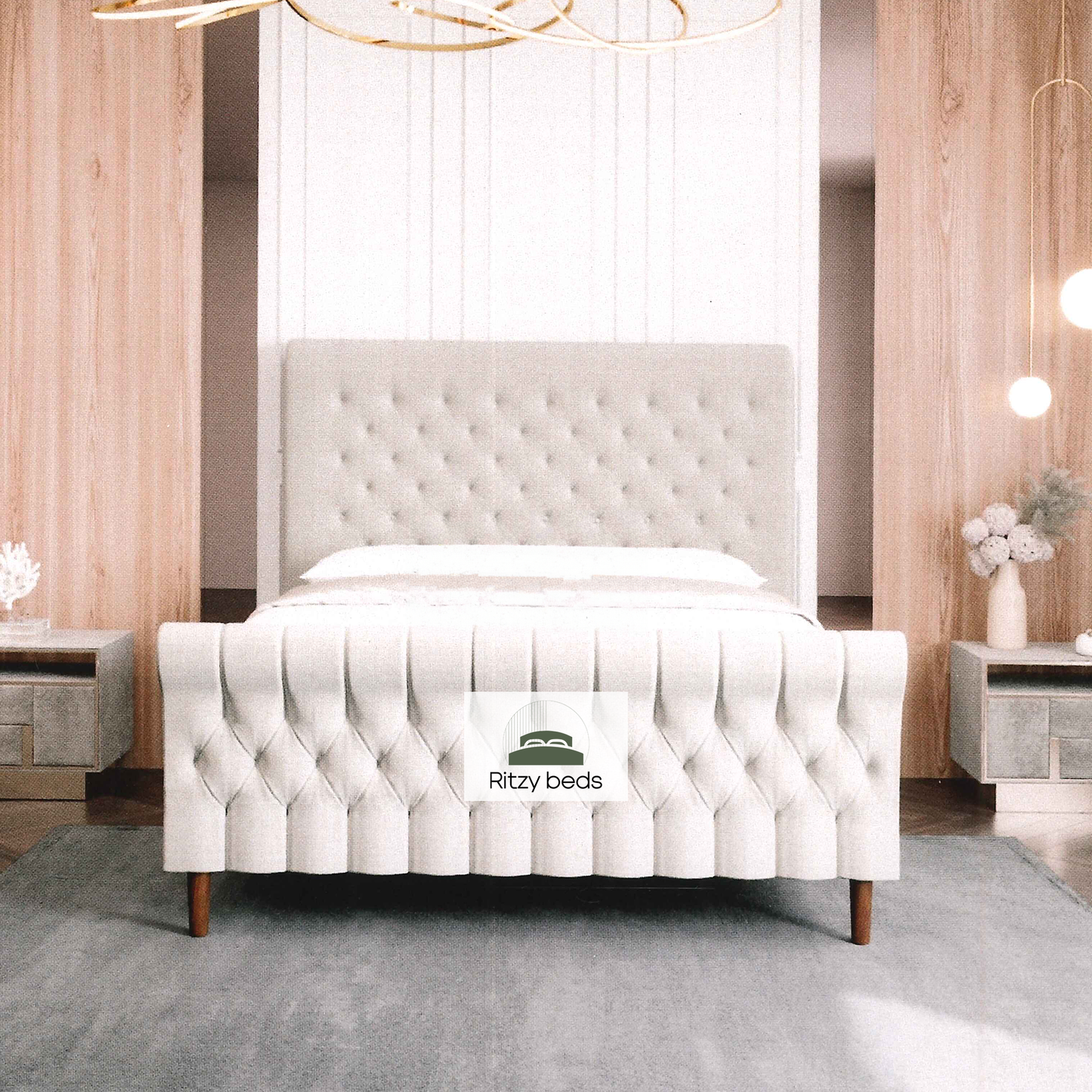 White tufted scroll luxury bed with 'Ritzy beds' logo in a bedroom setting
