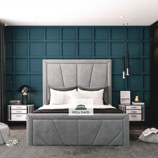Gray geomretric upholstered bespoke bed with white pillows against a teal paneled wall in a modern bedroom.