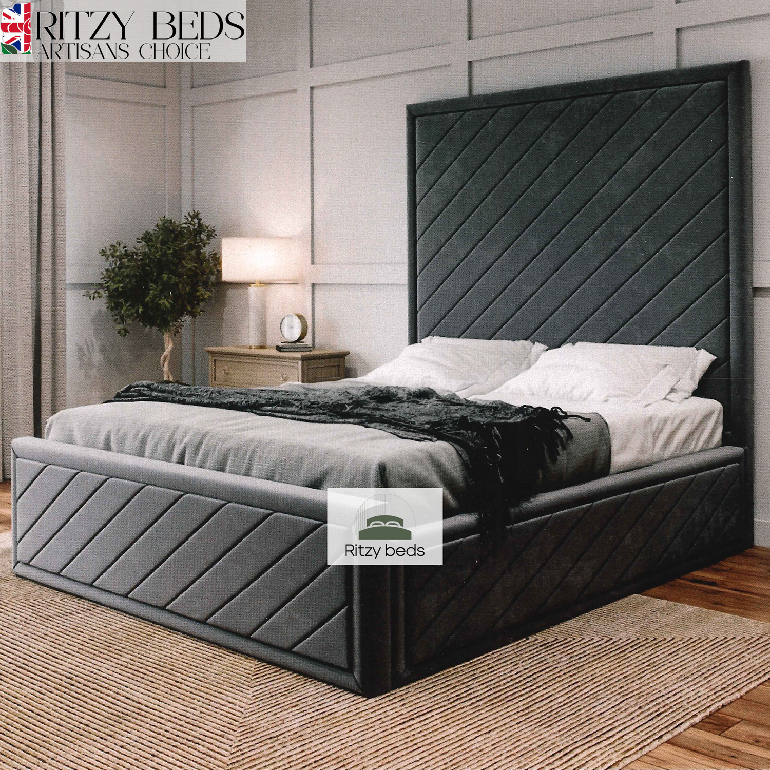 Gray upholstered bed with a modern angular handmade headboard in a bedroom setting, featuring the 'Ritzy Beds' brand.