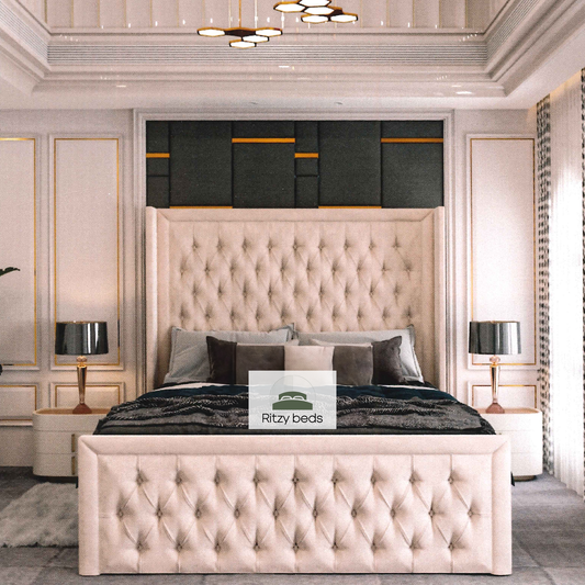 Luxurious bedroom with a tufted buttoned winged headboard and matching bed frame, featuring the brand 'Ritzy Beds'.
